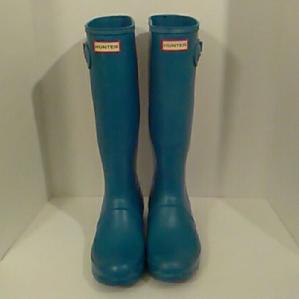 Tall blue hunter boots